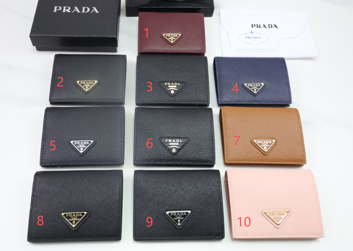 8afccaac-177d-4100-8642-f6651c028f12 Prada 二つ折り財布 ケース付き 8860 9*11.5cm - 画像 (1)