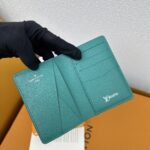 LOUIS VUITTON 二つ折り財布 長財布 カード入れ パスポートケース ケース付き M12664 - 画像 (7)